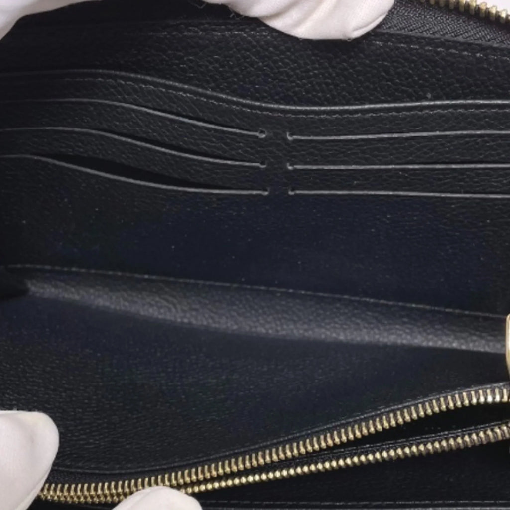 Empreinte Louis Long VUITTON Pre-Owned Zipper LOUIS Wallet (Good) Noir M61864 Vuitton Round Monogram Zippy LV